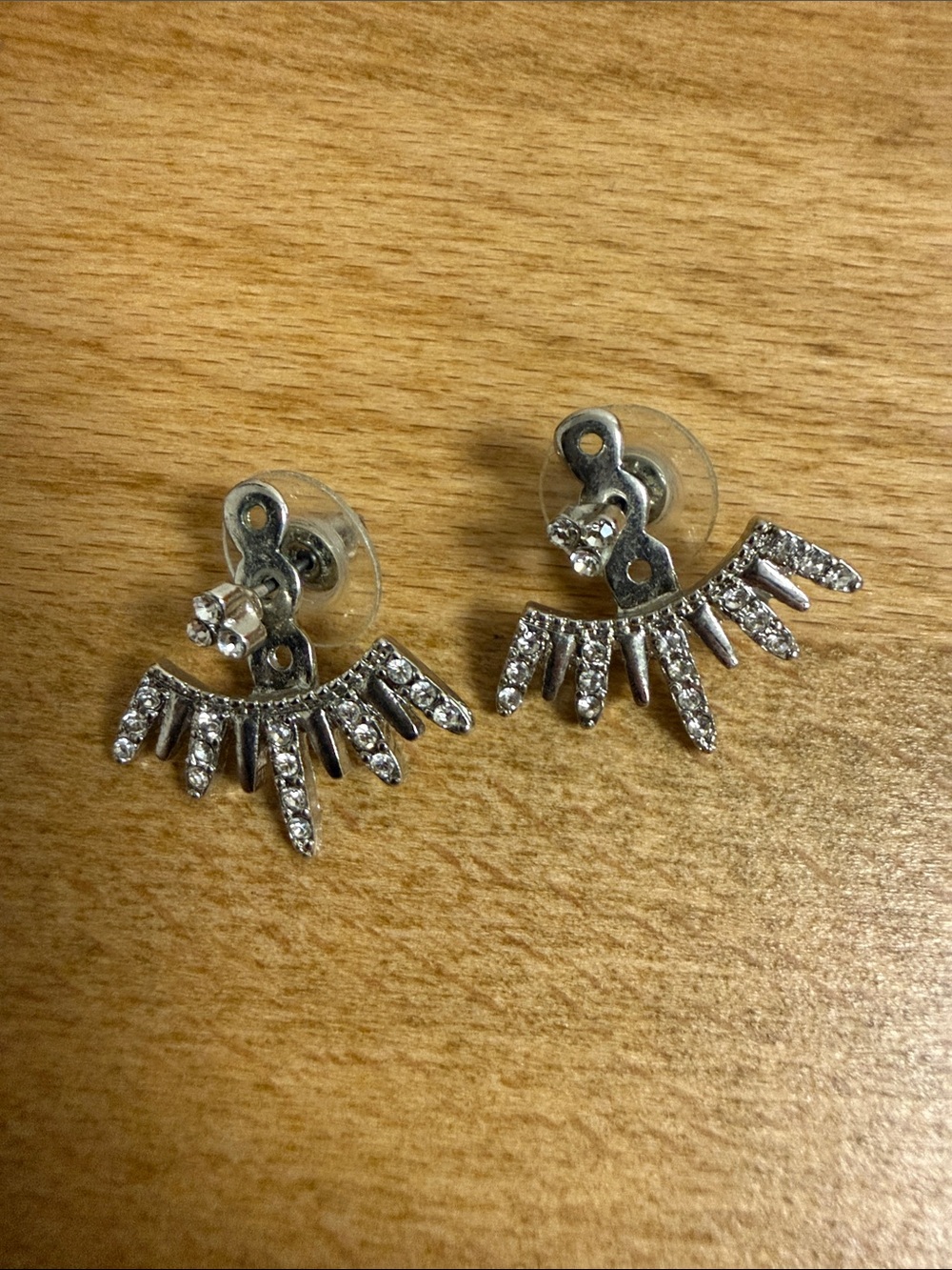 Layered front back tiered crystal studded abstract bird spike earrings silver